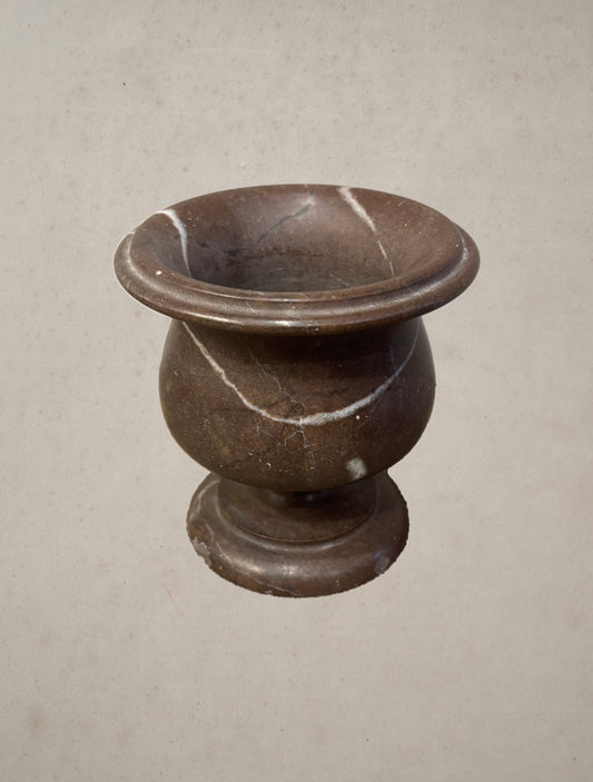 Petite 19th-century Belgian marble urn with flared lip and pedestal base, top view