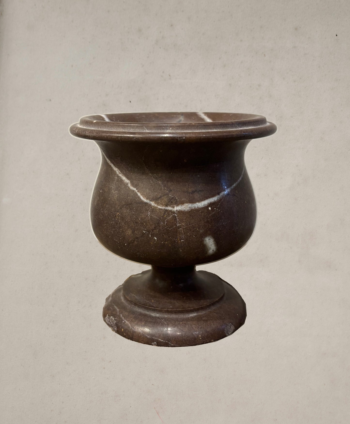 Petite 19th-century Belgian marble urn with flared lip and pedestal base