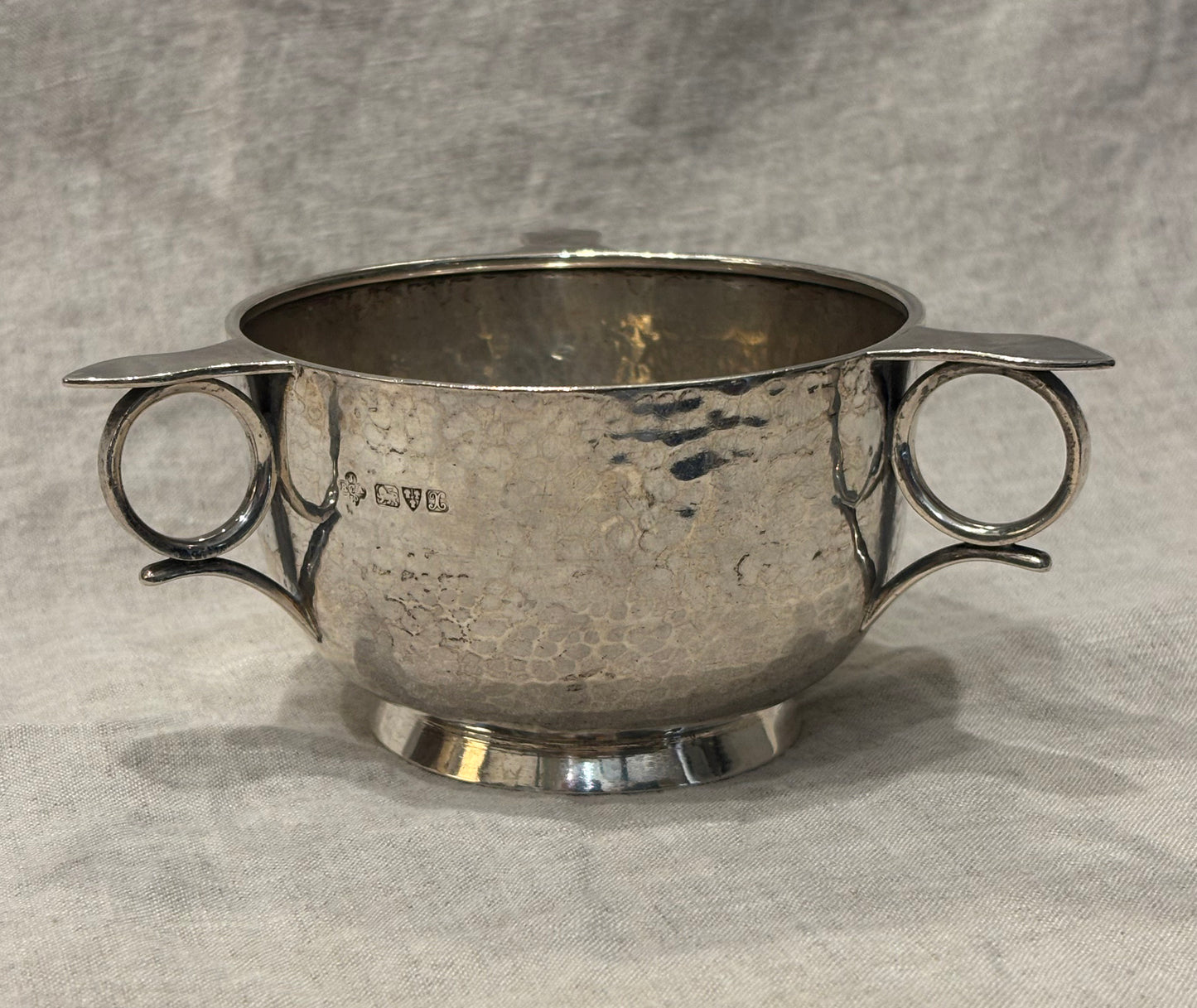 Hammered silver bowl with double handles and engraved name "Mary Langley", Arts and Crafts period