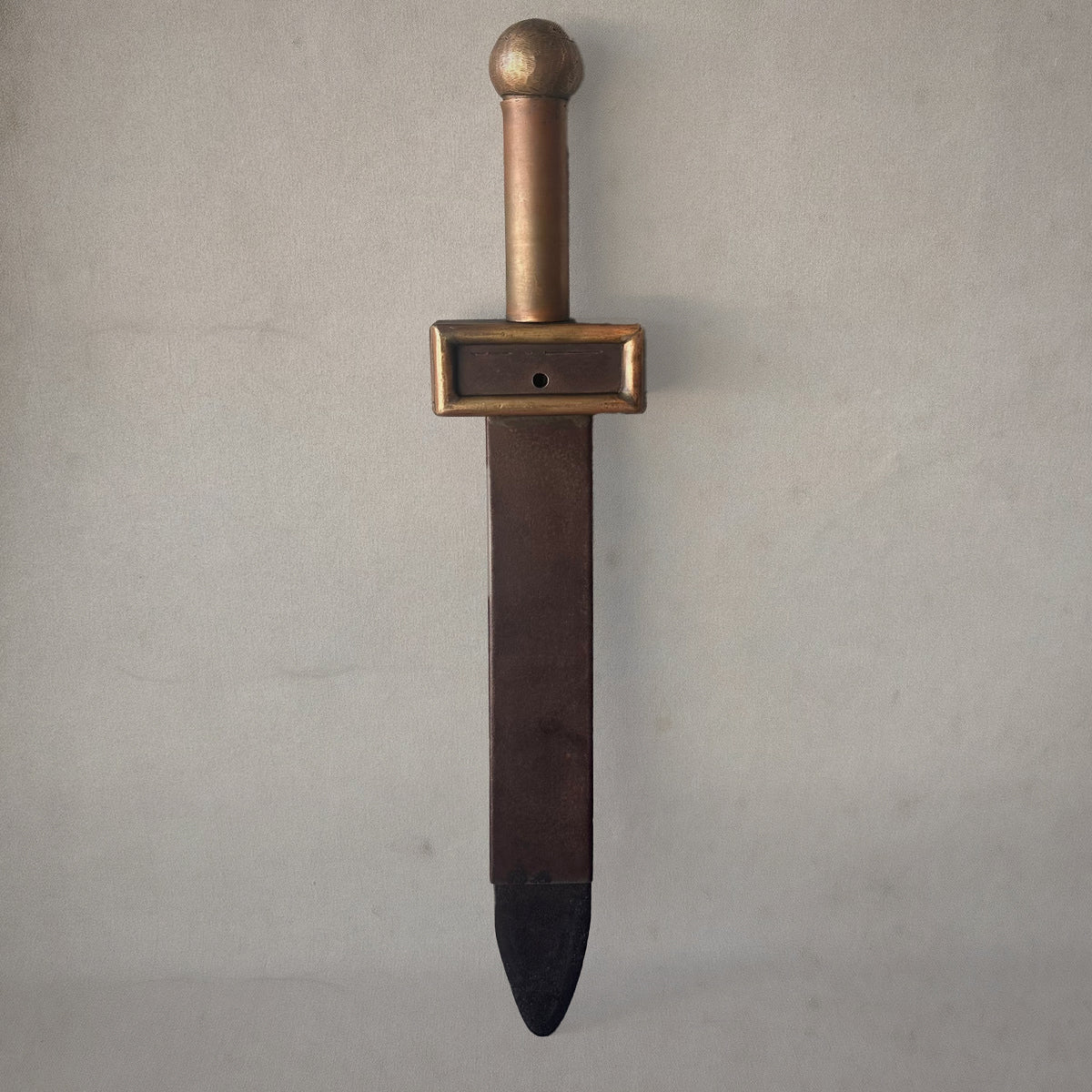 19th-century English theatrical sword with brass handle and collapsible metal blade