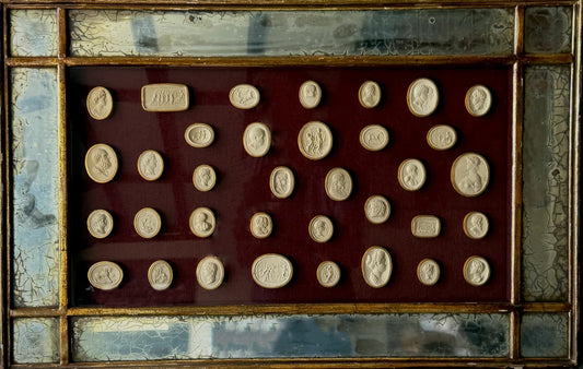 Framed Italian intaglios with mirrored gilt border, neoclassical Grand Tour display, 1840 close up