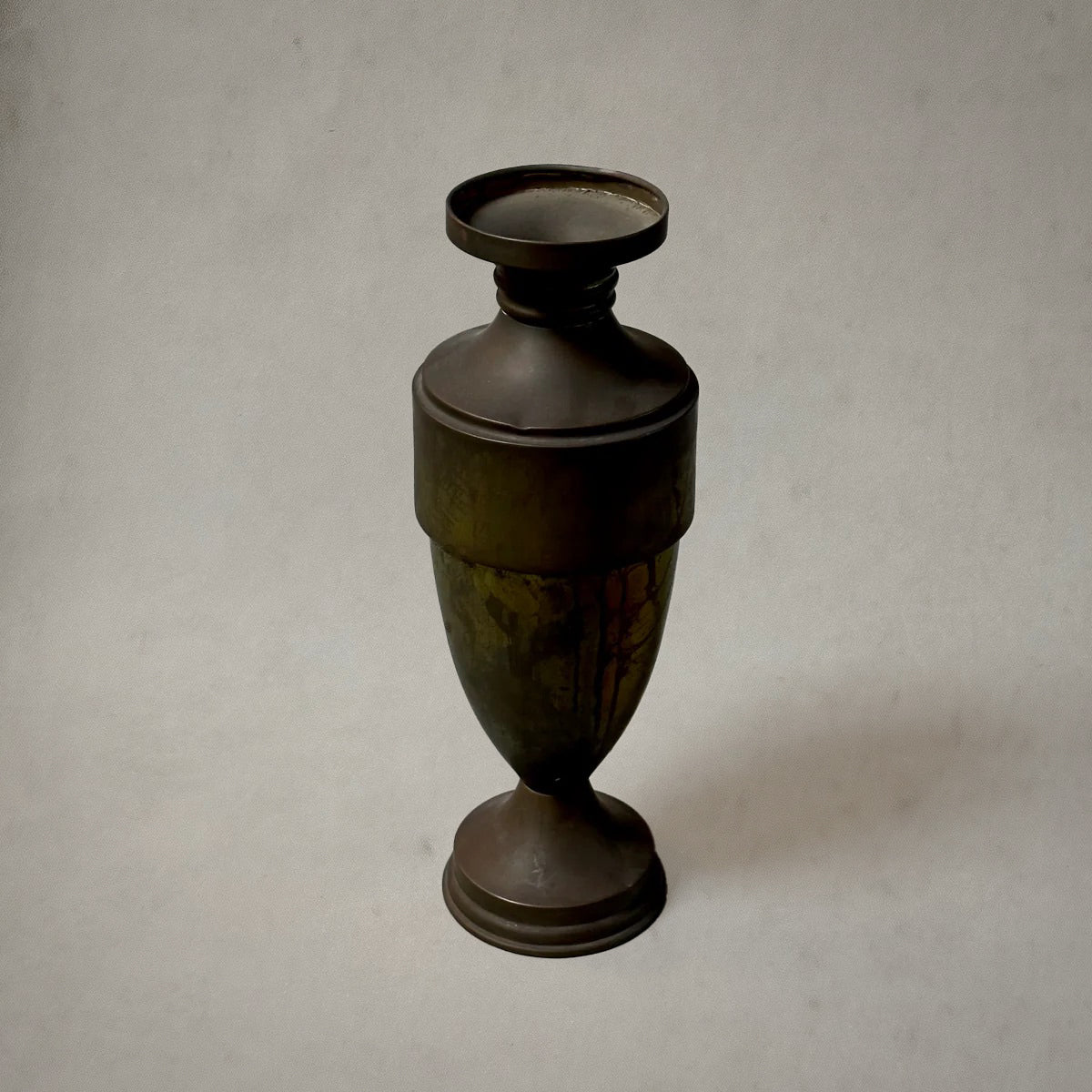 French brass urn with dark bronze patina and elegant silhouette, circa 1930