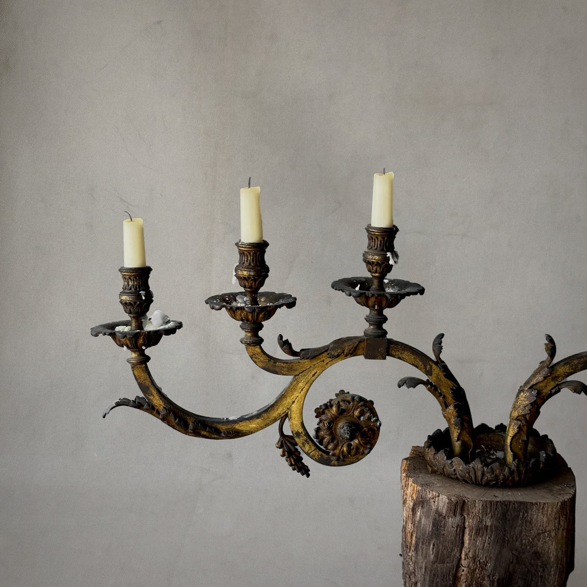 French gilt metal candelabrum with scrolling arms and wood base, 1880