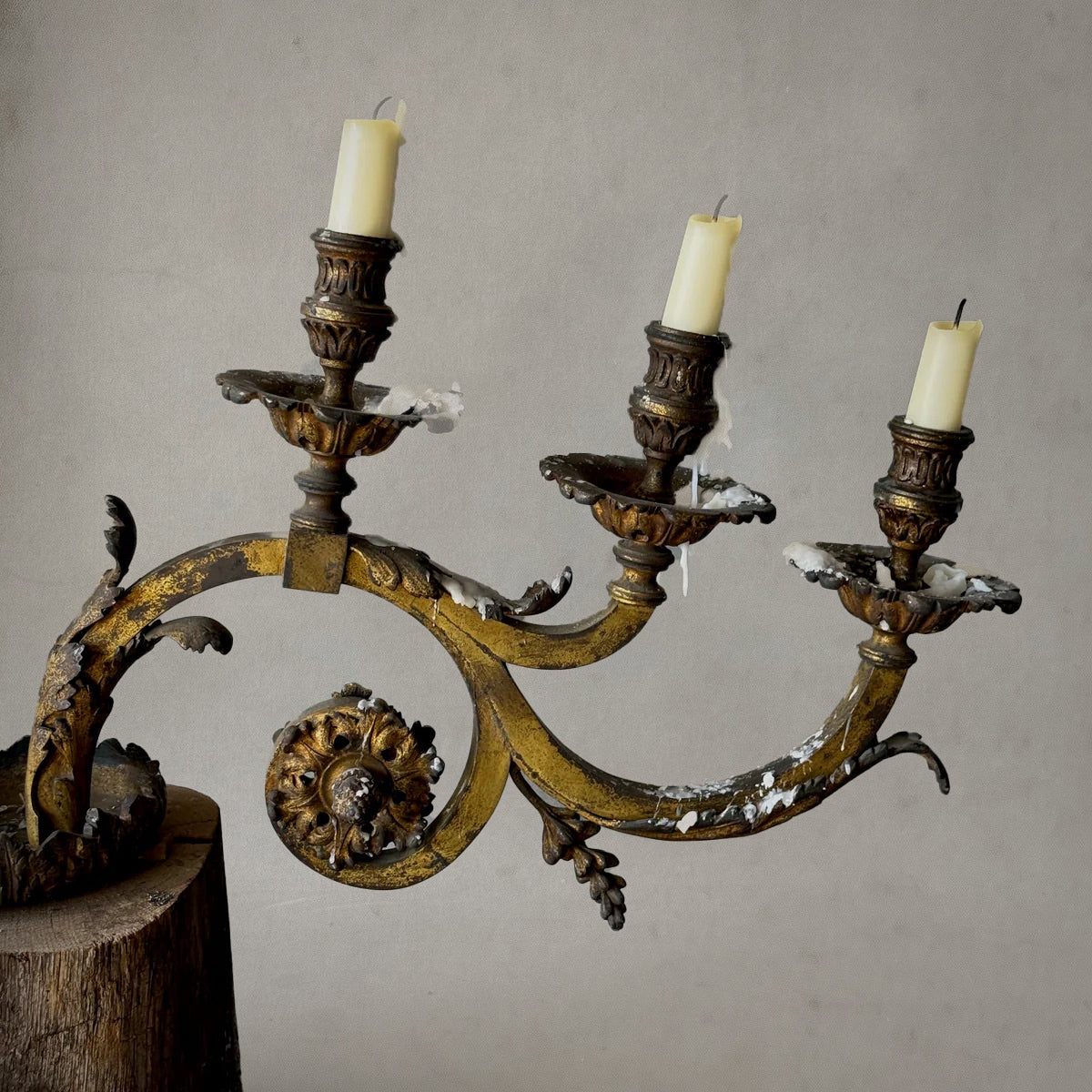 French gilt metal candelabrum with scrolling arms and wood base, 1880