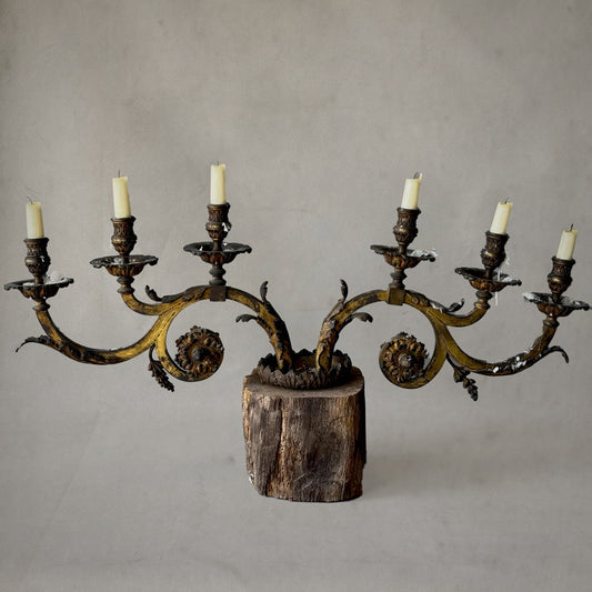 French gilt metal candelabrum with scrolling arms and wood base, 1880
