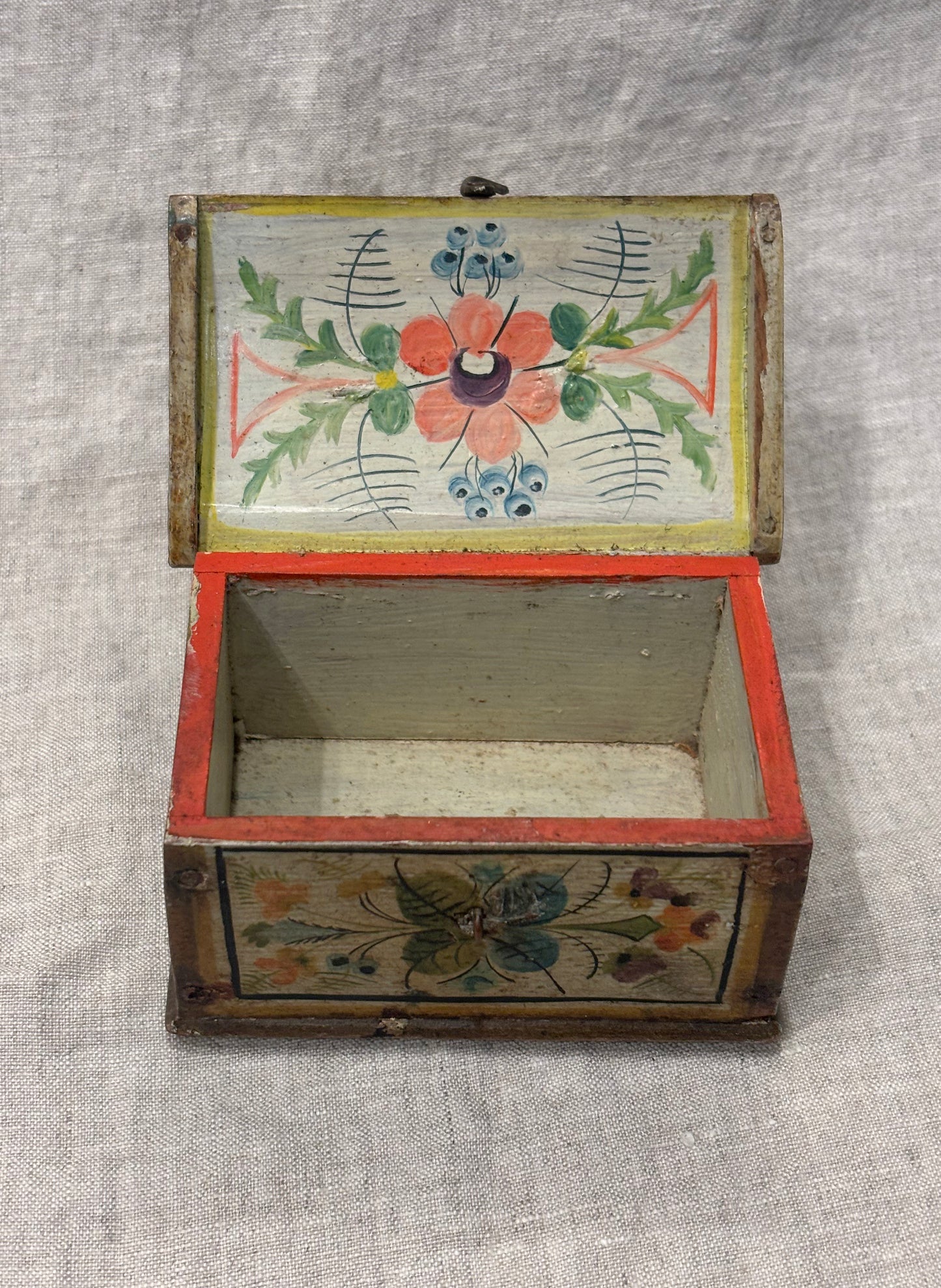 Antique hand-painted miniature chest with floral folk art design, circa 1880, open