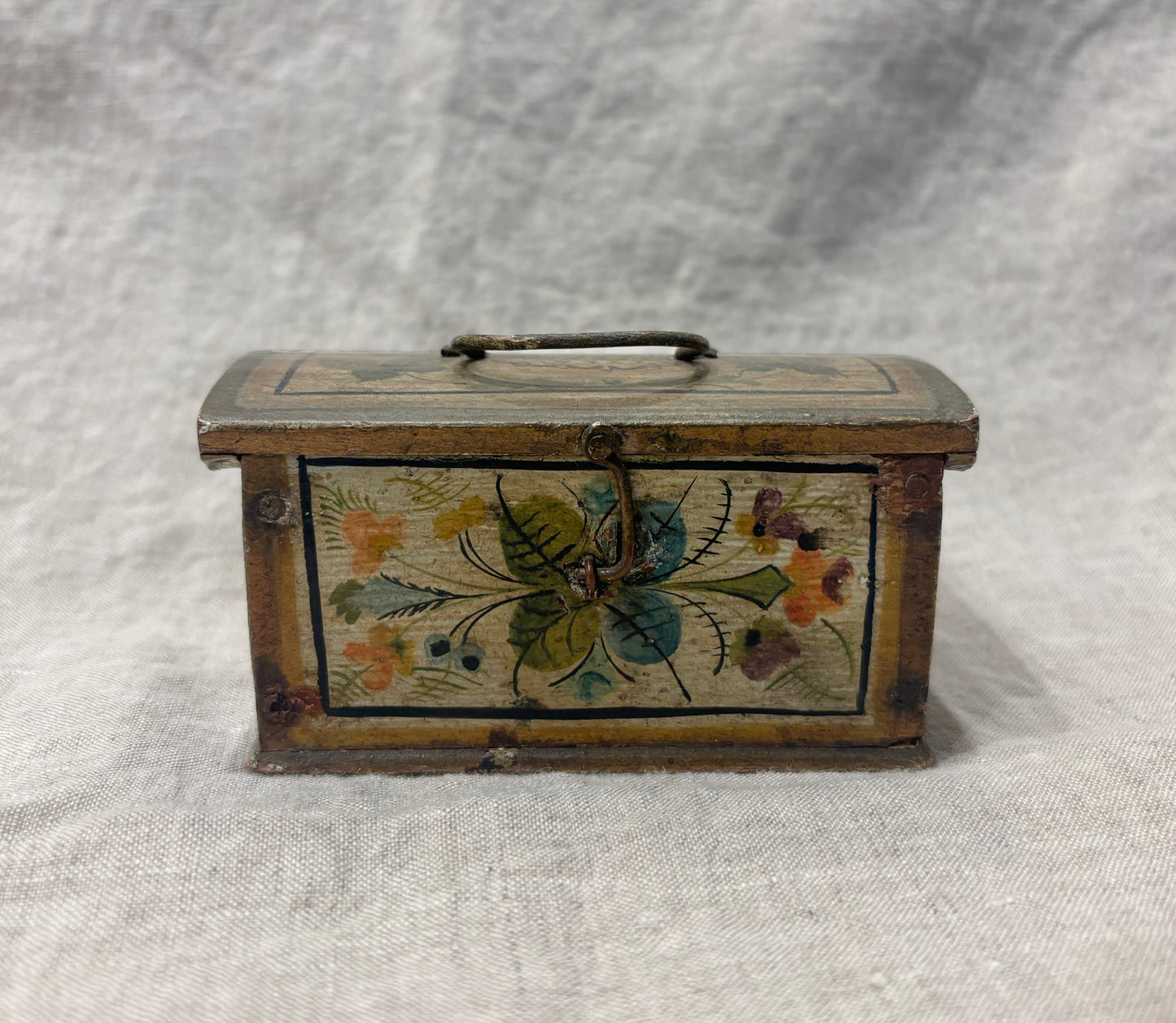 Antique hand-painted miniature chest with floral folk art design, circa 1880