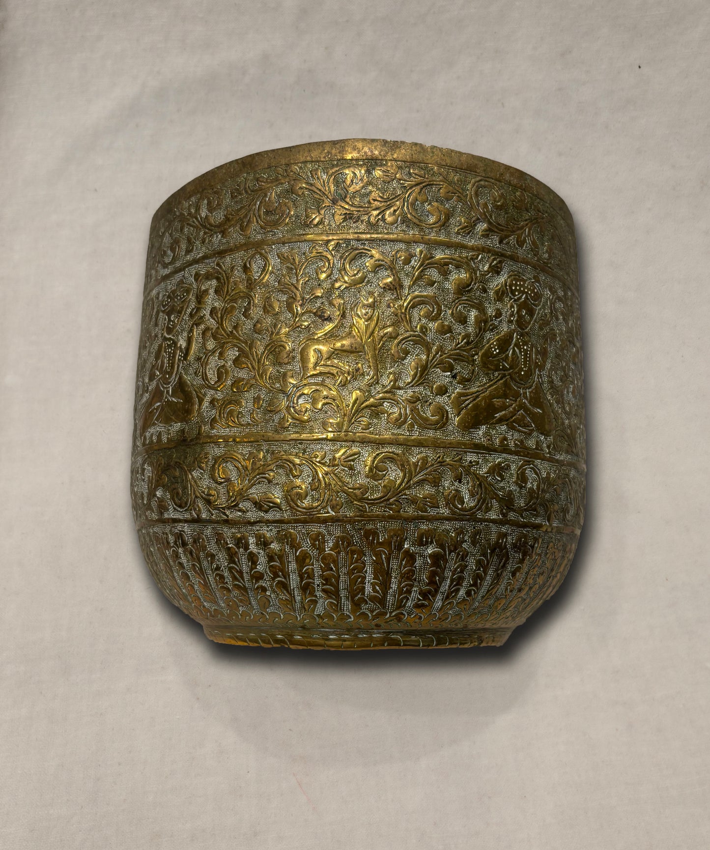 Hand-engraved Indian brass vessel with Mughal-inspired figures and floral motifs, detail 1