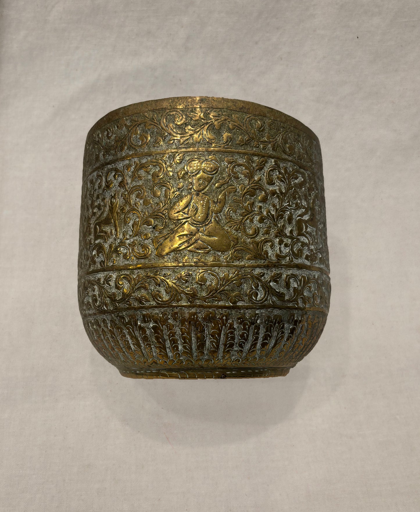 Hand-engraved Indian brass vessel with Mughal-inspired figures and floral motifs, detail 2