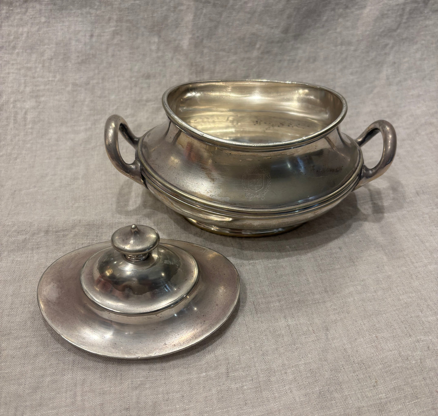 Antique silver-plated sugar bowl by GM Co. with engraved crest and lid, lid off