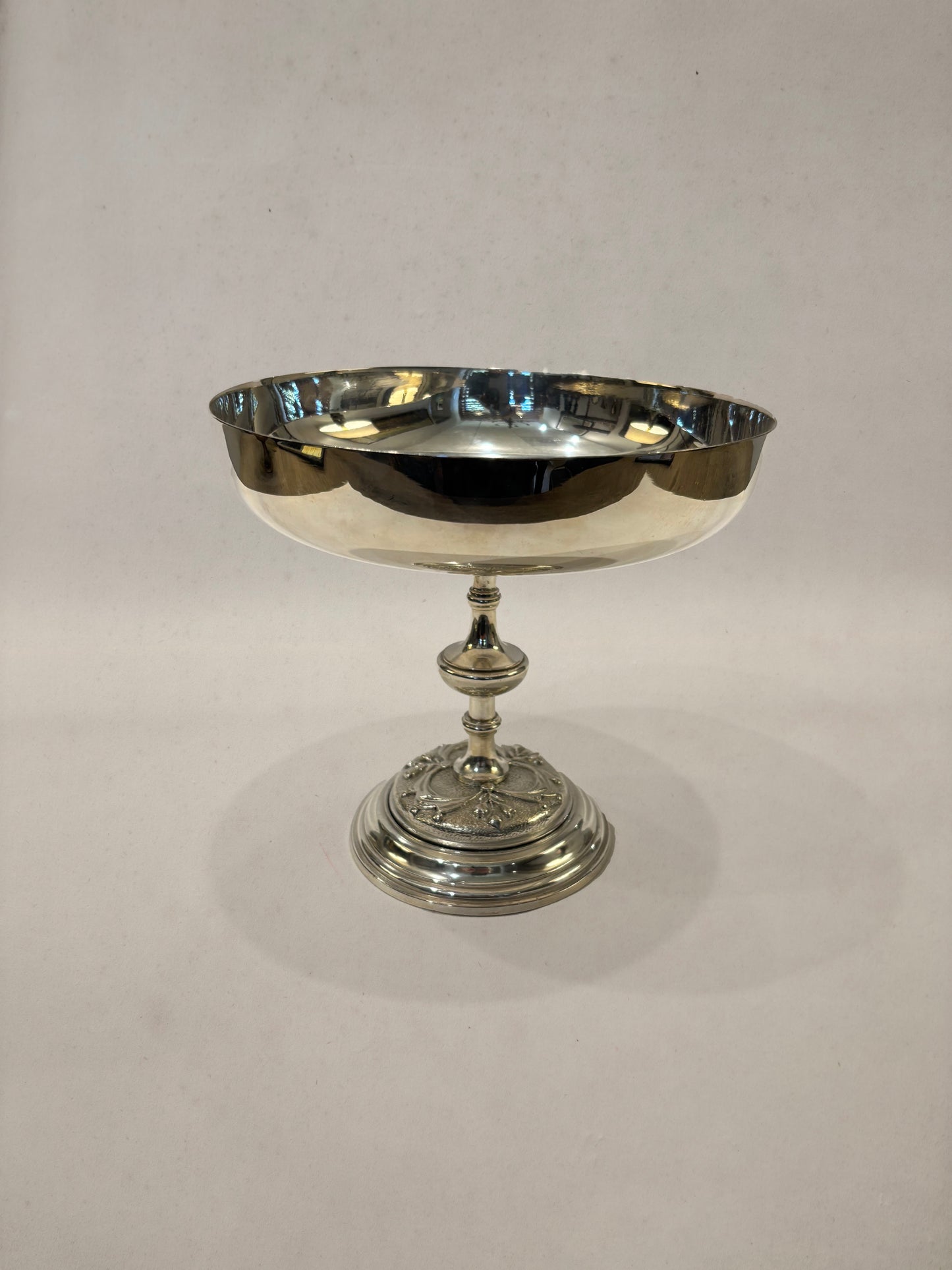Silverplate footed bowl with embossed medallion and floral motifs, England circa 1900