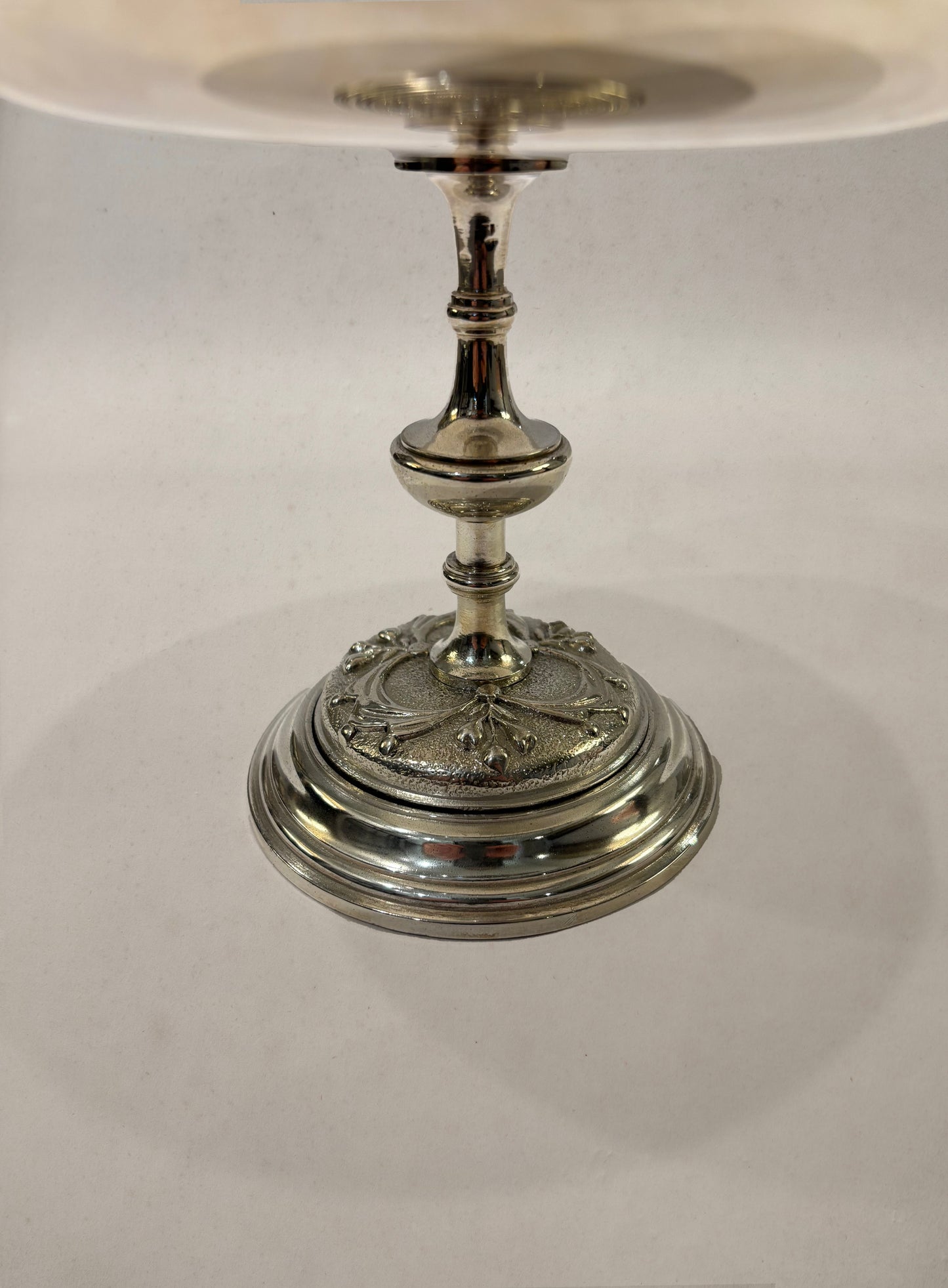 Silverplate footed bowl with embossed medallion and floral motifs, England circa 1900