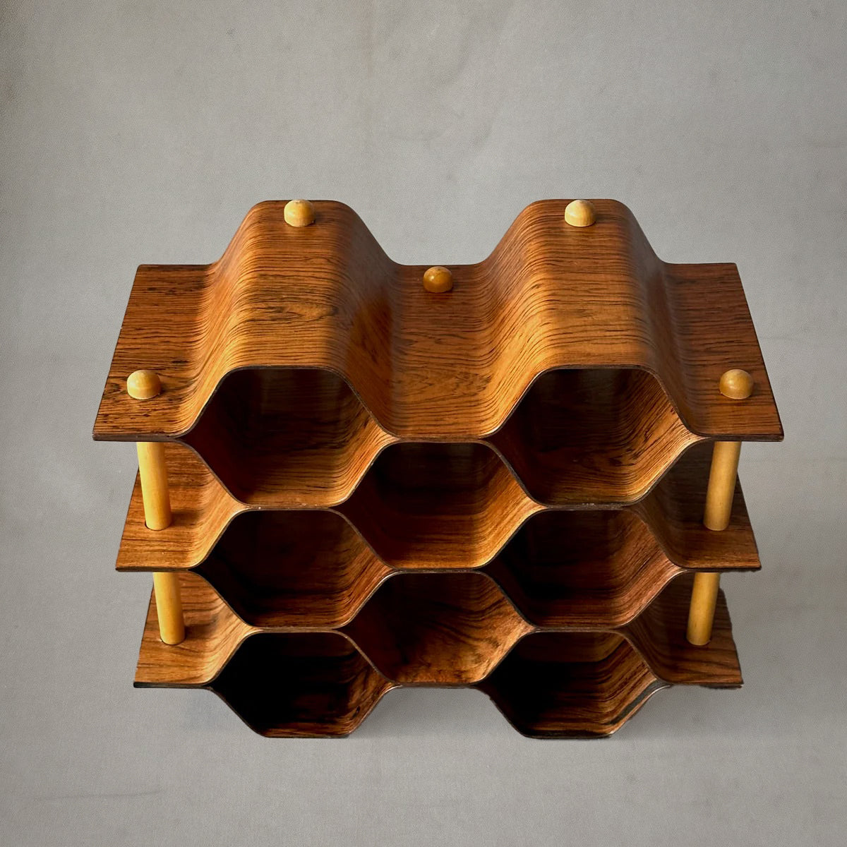 Mid-century Swedish wine rack by Torsten Johansson in bent rosewood and beech, circa 1960