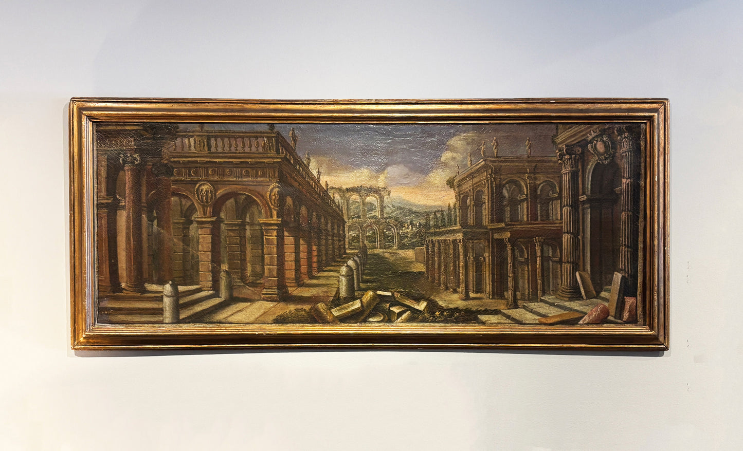18th-century Italian capriccio oil painting with classical Roman ruins in a gilt wood frame