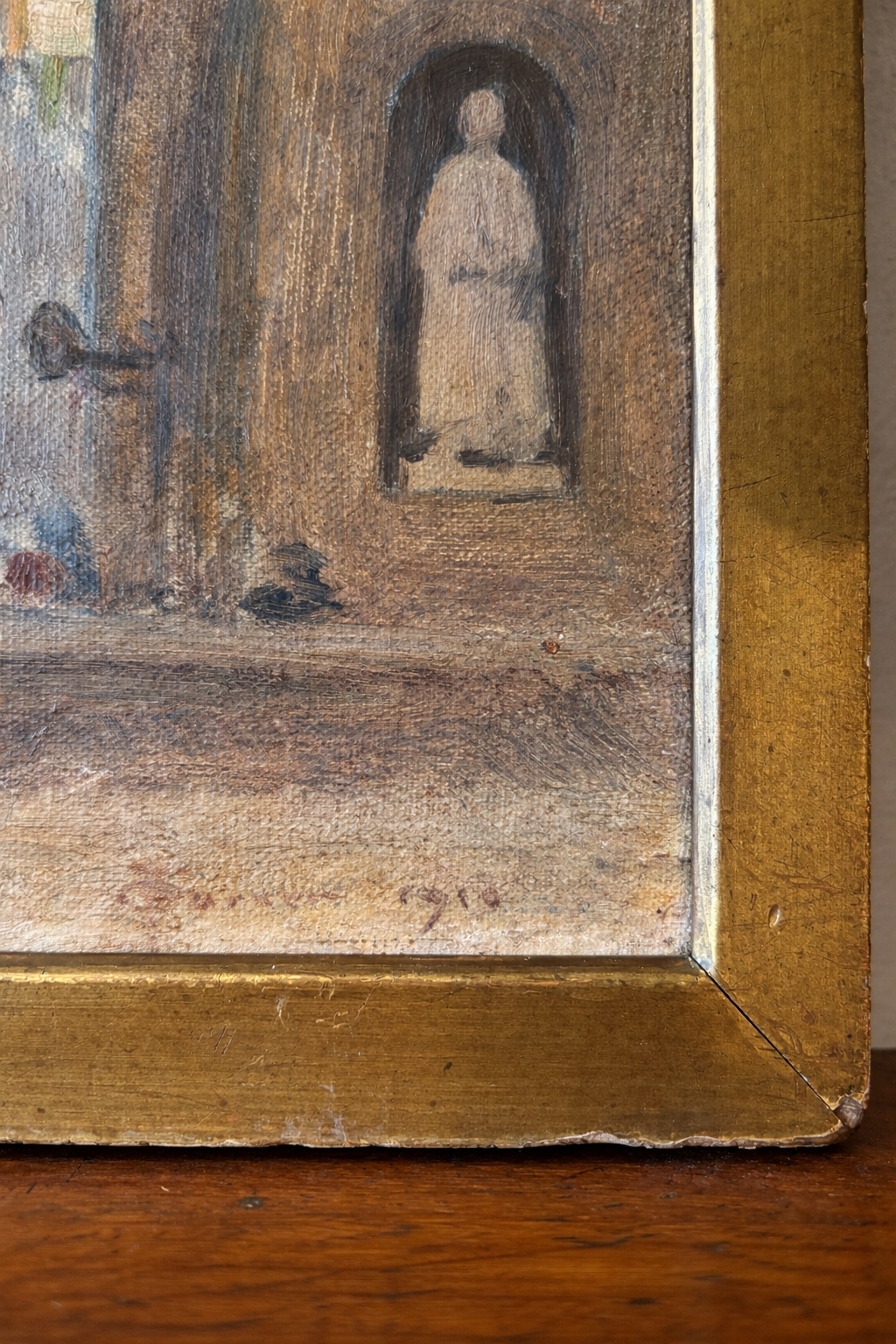 Close-up of lower section of Florence cityscape painting showing indistinct artist signature and date circa 1910.