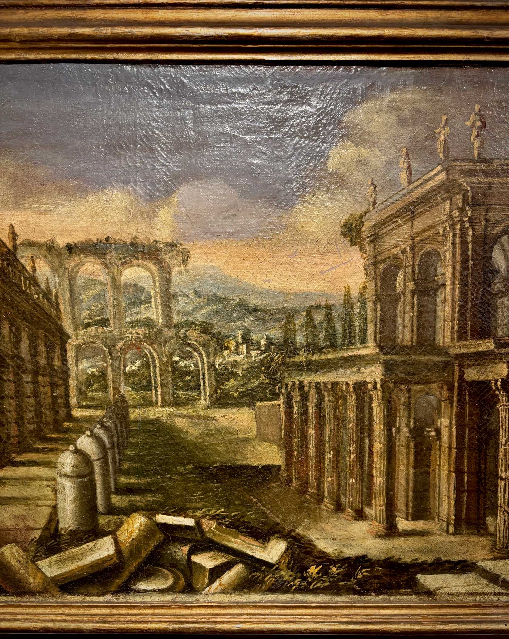 Close-up of classical Roman architectural details in capriccio-style Italian painting