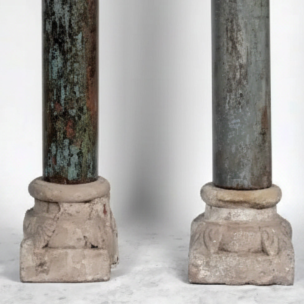 detail of Pair of antique French painted architectural columns' aquamarine finish and stone bases