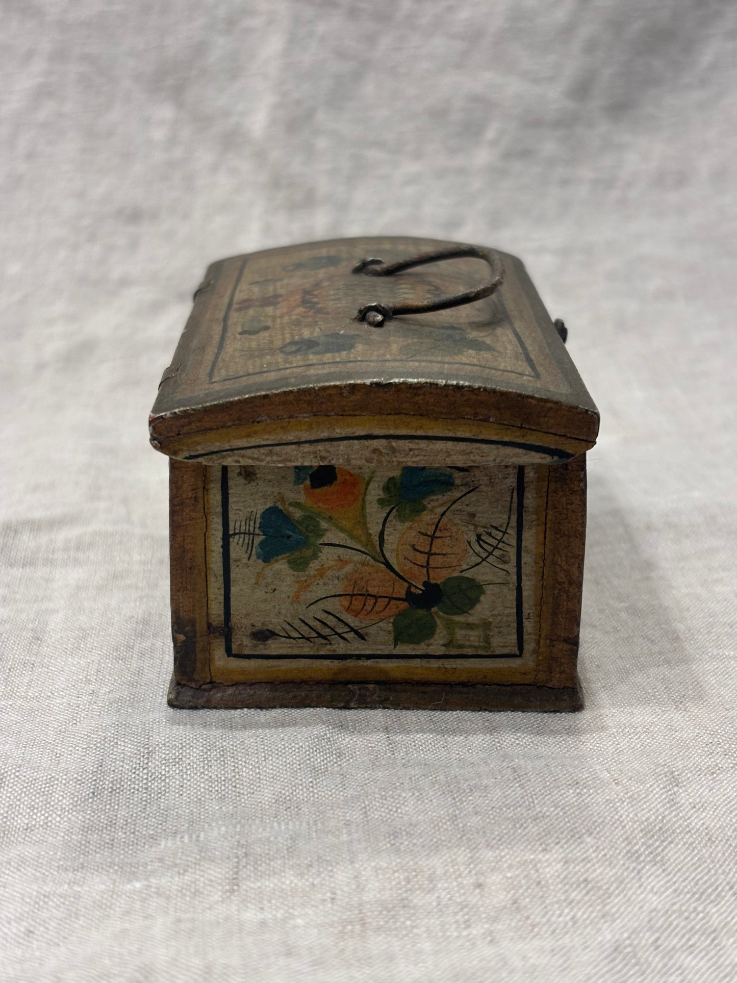 Antique hand-painted miniature chest with floral folk art design, circa 1880, left