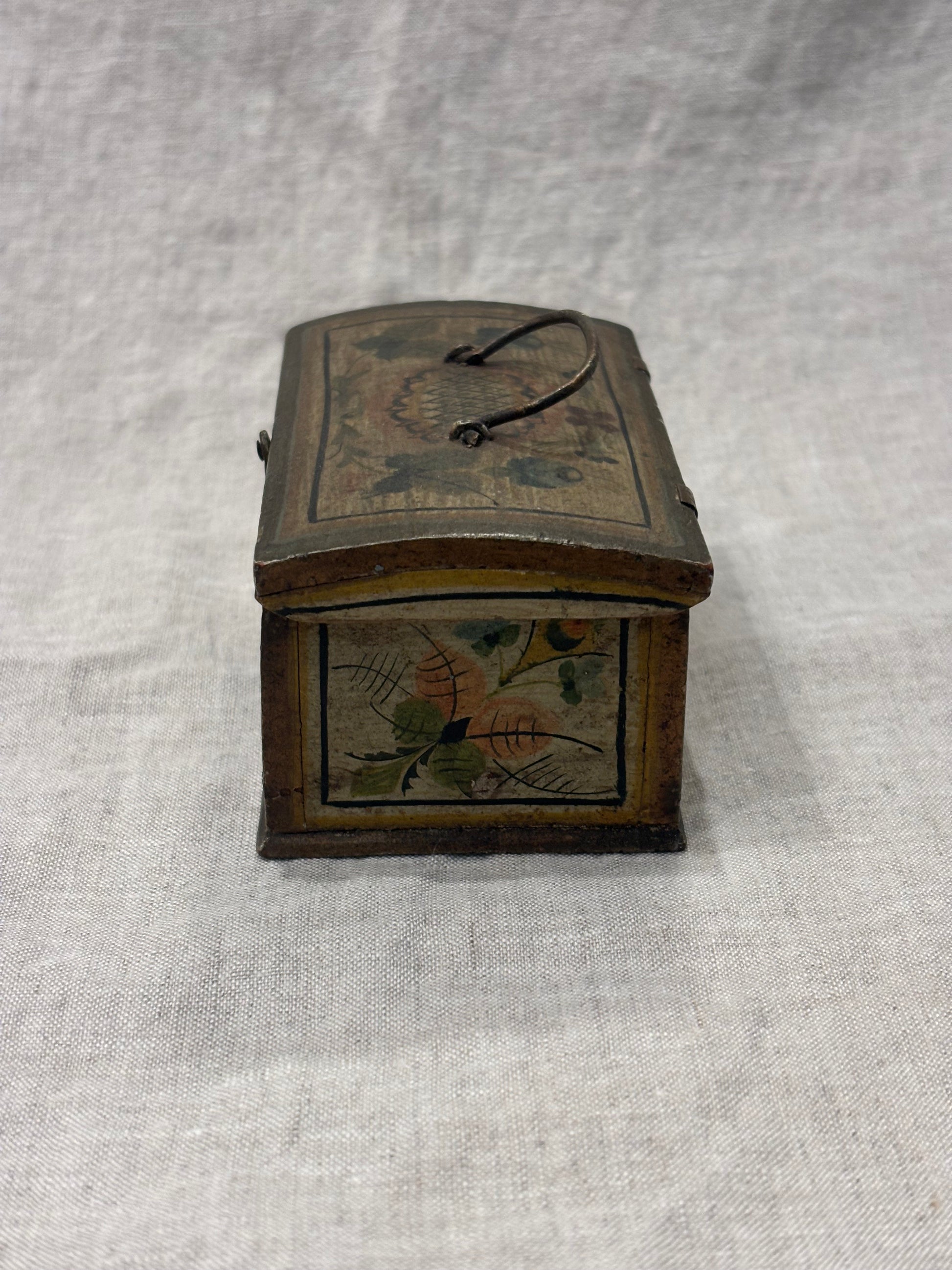 Antique hand-painted miniature chest with floral folk art design, circa 1880, right