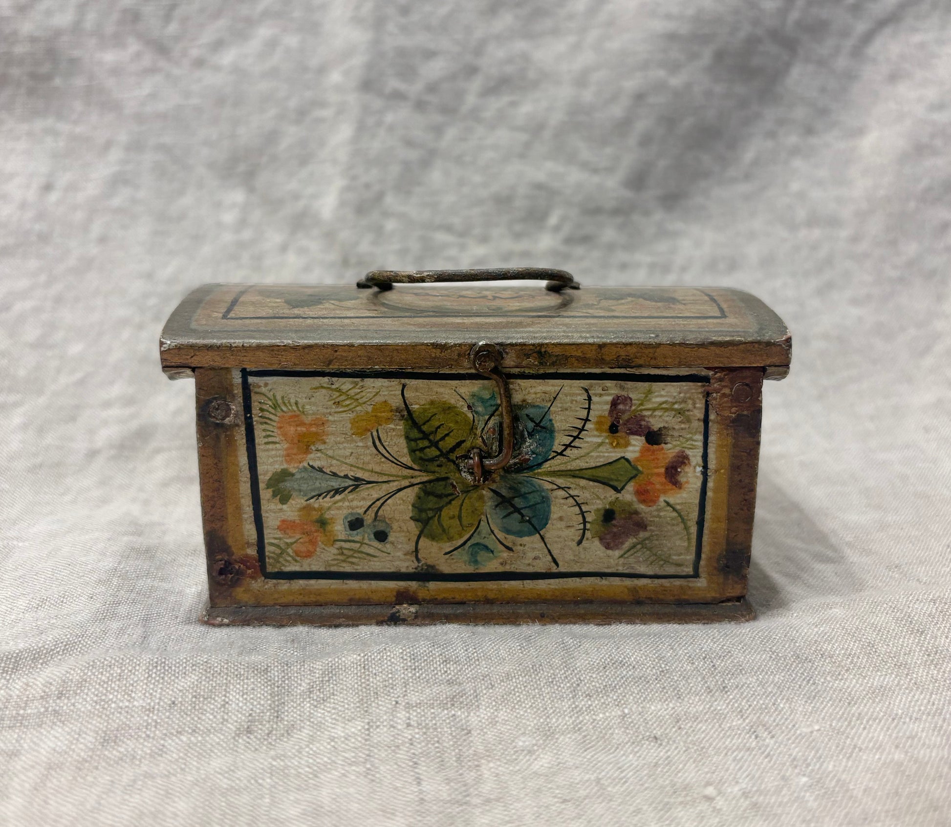 Antique hand-painted miniature chest with floral folk art design, circa 1880