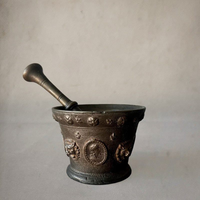 Antique Italian bronze mortar and pestle with lion medallions, circa 1700, inside