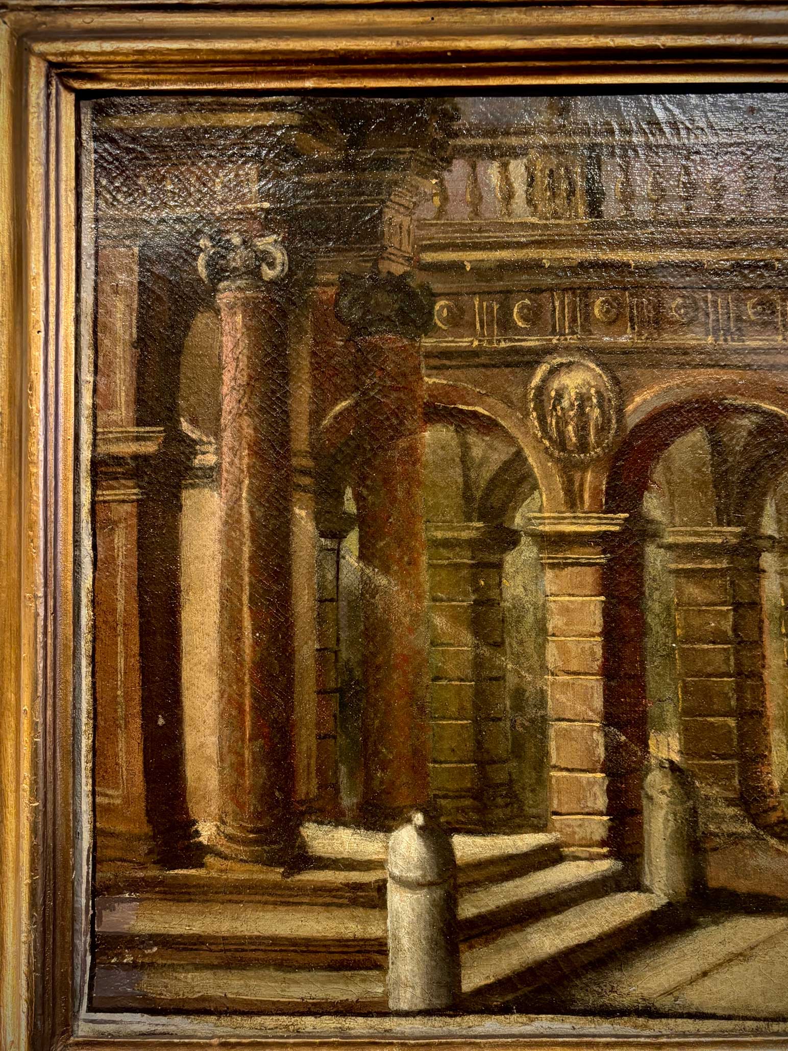 Left side close-up of classical Roman architectural details in capriccio-style Italian painting

