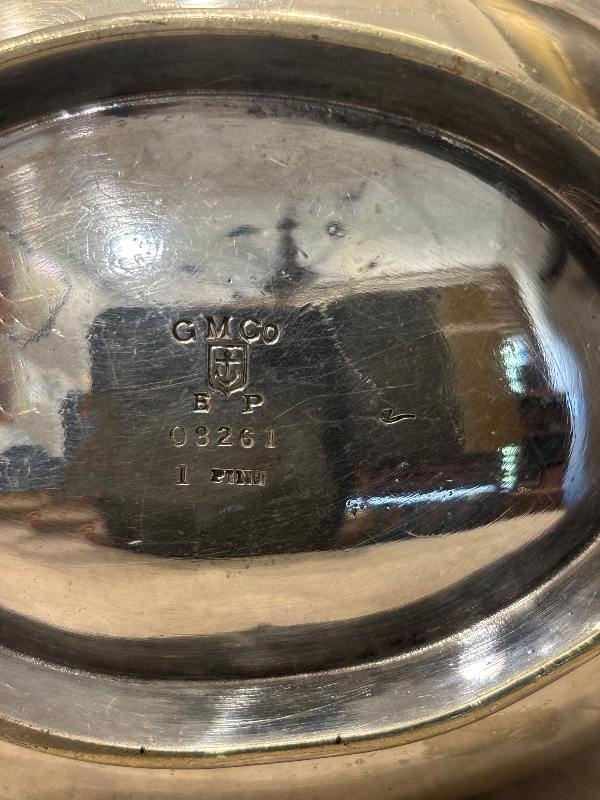 Antique silver-plated sugar bowl by GM Co. with engraved crest and lid, bottom detail