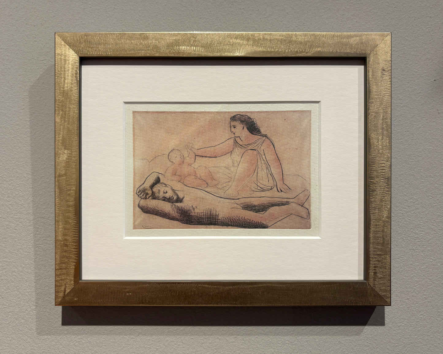 Vintage lithograph of reclining and seated classical figures in gold frame, mid-20th century, on wall